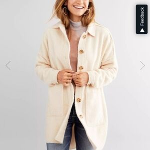 A peach fleece Sherpa jacket